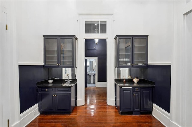 kitchen with sink and dark wood-type flooring