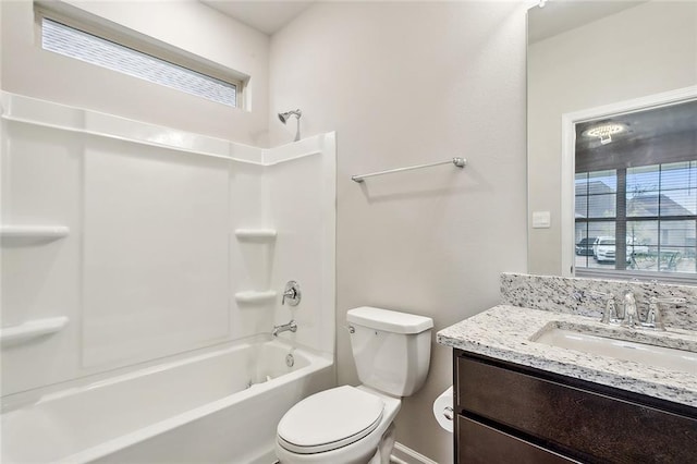 full bathroom with shower / tub combination, vanity, and toilet