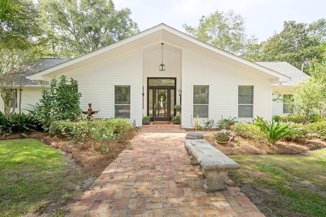 doorway to property featuring french doors