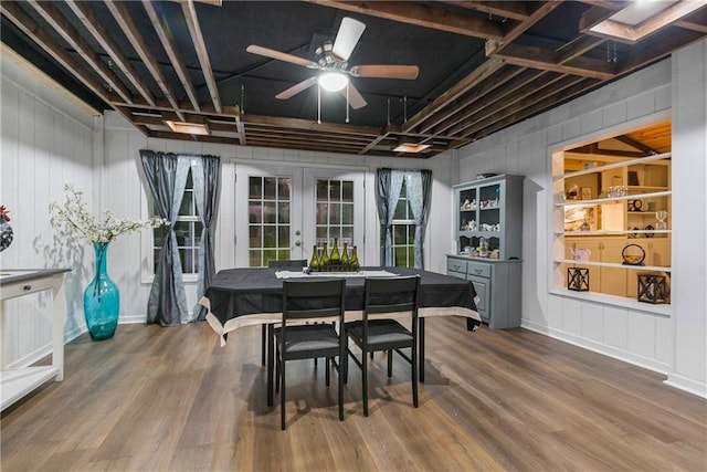 dining area featuring hardwood / wood-style floors, ceiling fan, and french doors