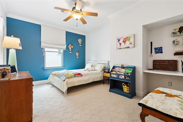 bedroom featuring ceiling fan and crown molding