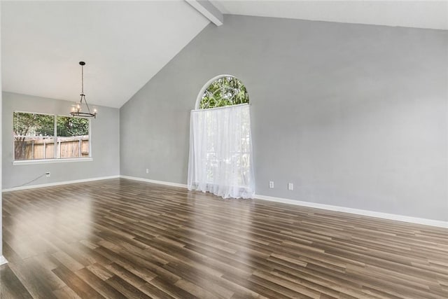 spare room with beamed ceiling, a chandelier, dark hardwood / wood-style flooring, and high vaulted ceiling