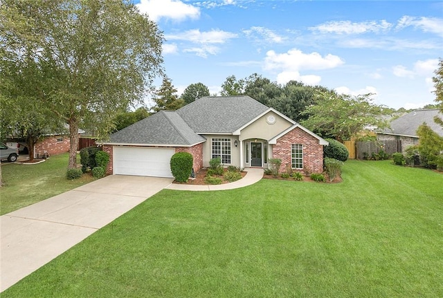 ranch-style house featuring a garage and a front yard