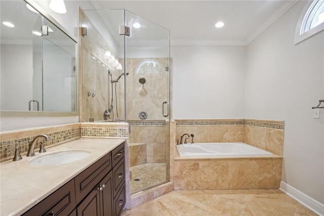 bathroom with vanity, shower with separate bathtub, and ornamental molding