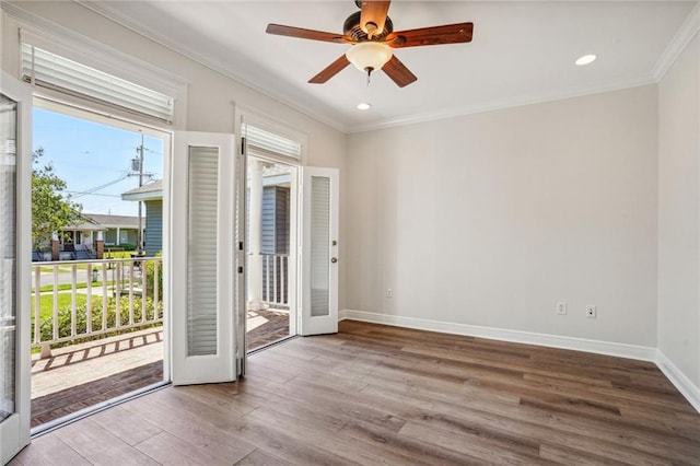 entryway featuring french doors, light hardwood / wood-style flooring, crown molding, and ceiling fan