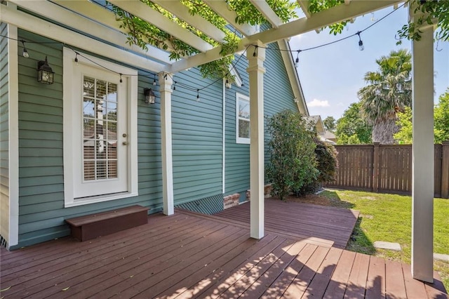 wooden deck with a yard