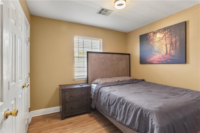 bedroom featuring light hardwood / wood-style floors