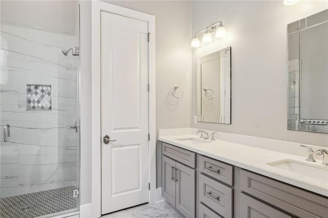 bathroom with vanity and an enclosed shower