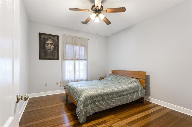 unfurnished bedroom with ceiling fan, multiple closets, and light colored carpet