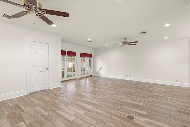 spare room with light wood-type flooring, crown molding, and ceiling fan