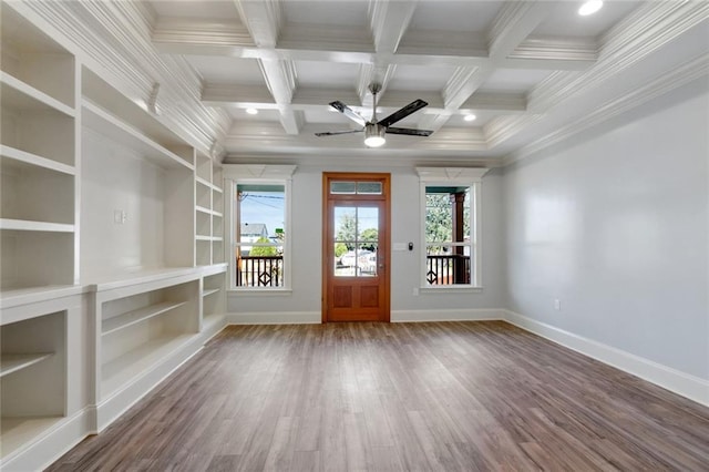 foyer entrance with ceiling fan, beamed ceiling, hardwood / wood-style floors, and crown molding