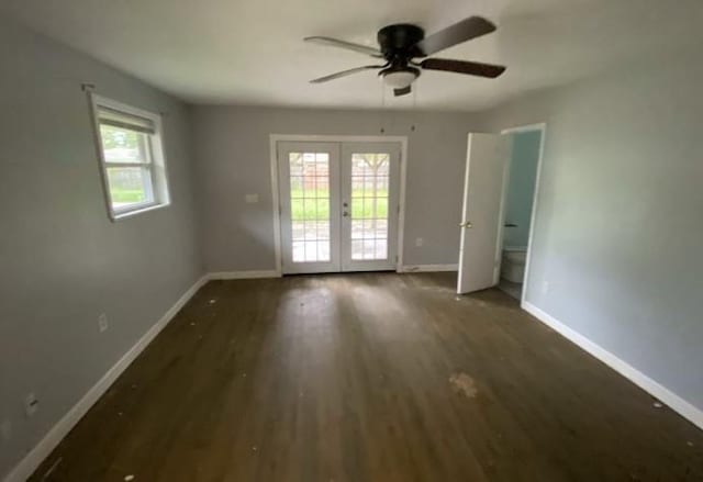 103 W Hickory St, Mandeville, LA 70471 - interior space with wood finished floors, french doors, ceiling fan, and baseboards