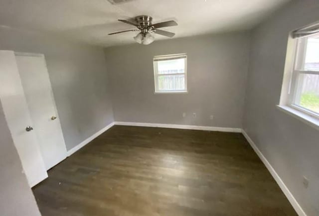 103 W Hickory St, Mandeville, LA 70471 - unfurnished room featuring baseboards, ceiling fan, and plenty of natural light
