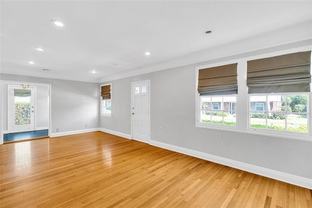 interior space featuring light wood-type flooring and a wealth of natural light