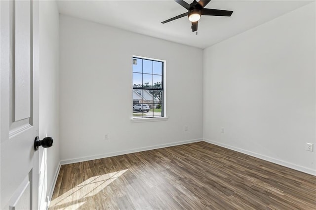 empty room with wood-type flooring and ceiling fan