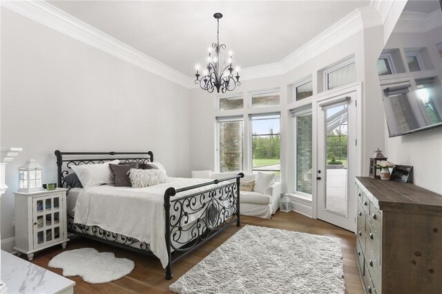 bedroom featuring access to outside, crown molding, an inviting chandelier, and dark wood-type flooring