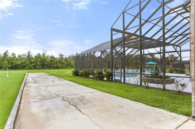 view of patio with a lanai