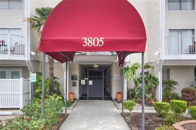 property entrance with a balcony