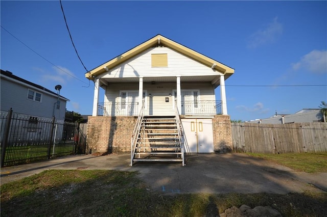 bungalow-style home with covered porch