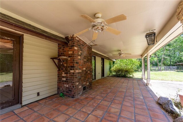 view of patio / terrace featuring ceiling fan