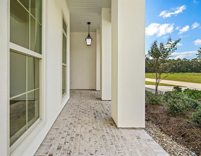 doorway to property featuring a patio area