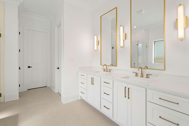 bathroom with ornamental molding, a shower with shower door, and vanity