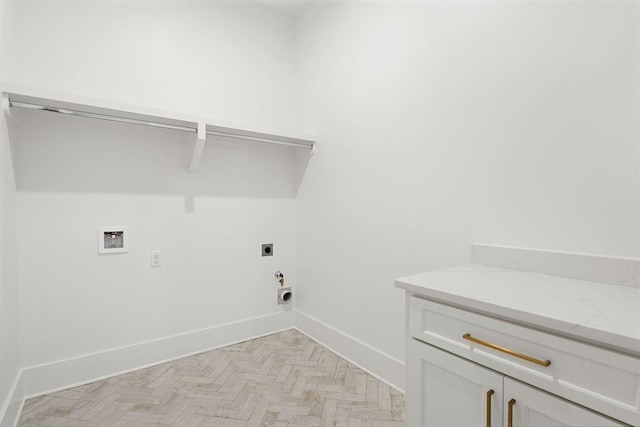 laundry room with light parquet flooring, washer hookup, and electric dryer hookup