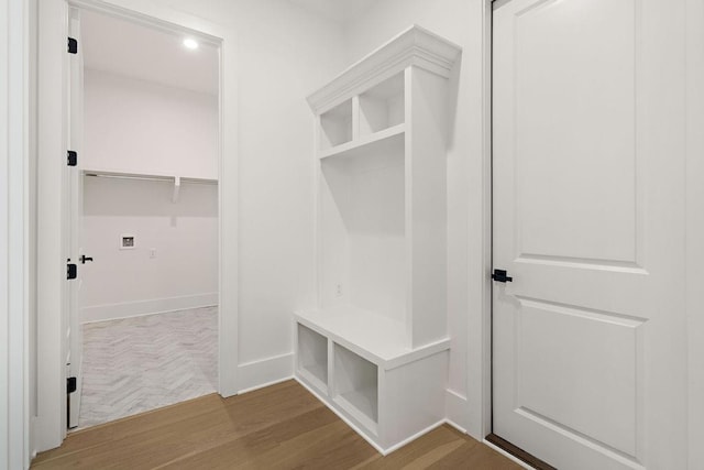 mudroom featuring wood-type flooring