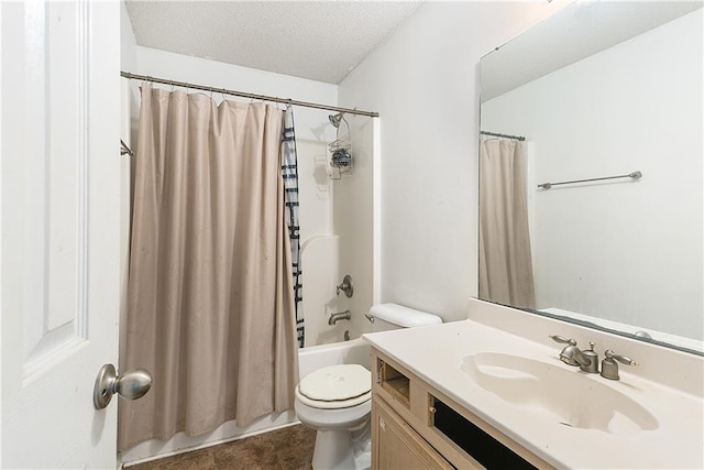 full bathroom with vanity, shower / bath combo with shower curtain, toilet, and a textured ceiling