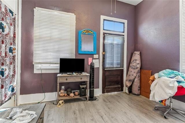 office space with light hardwood / wood-style floors