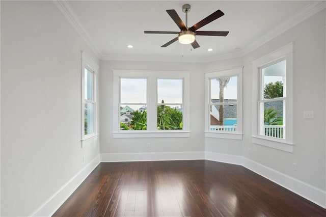 empty room featuring ornamental molding, ceiling fan, and dark hardwood / wood-style flooring