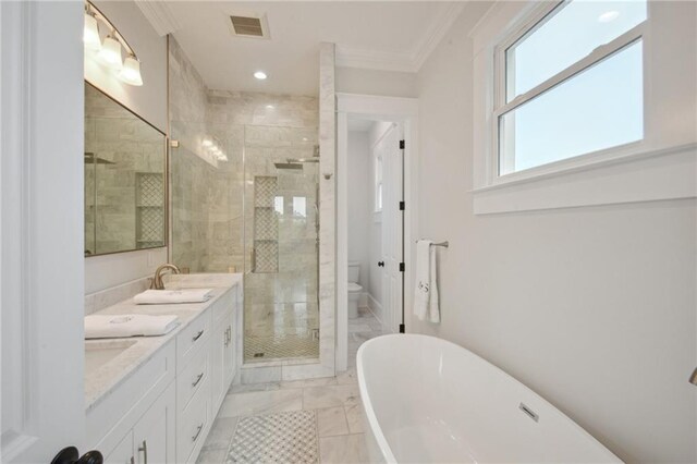 full bathroom with ornamental molding, vanity, plus walk in shower, and toilet