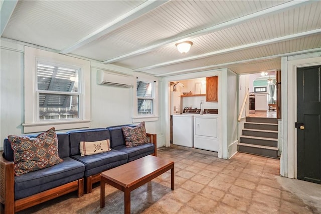 living room featuring separate washer and dryer, beam ceiling, and a wall unit AC