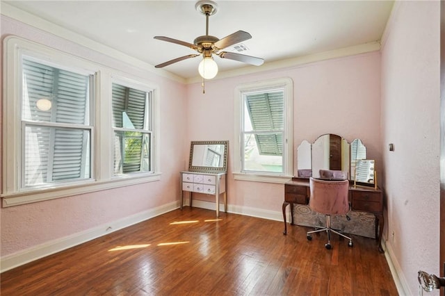 office with ornamental molding, ceiling fan, plenty of natural light, and dark wood-type flooring