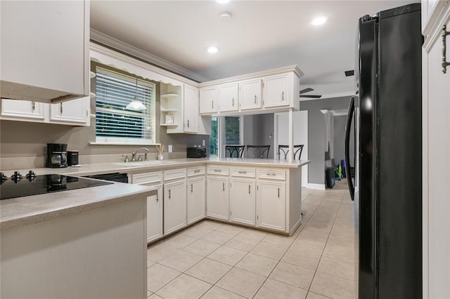 kitchen featuring white cabinetry, kitchen peninsula, black appliances, light tile patterned floors, and ceiling fan