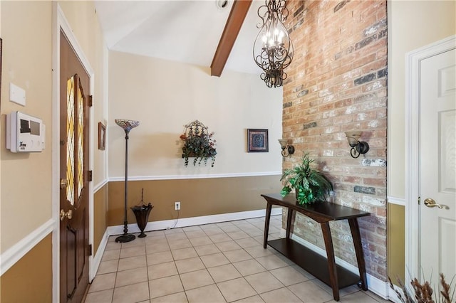 tiled foyer featuring vaulted ceiling with beams