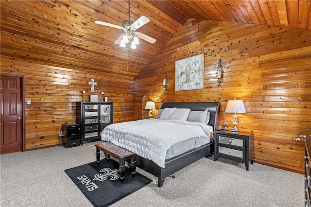 bedroom with wood walls, carpet floors, high vaulted ceiling, ceiling fan, and wooden ceiling