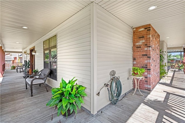 wooden terrace with covered porch