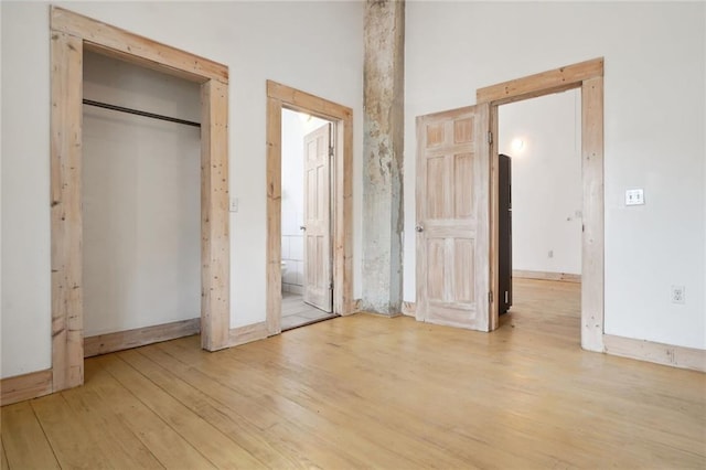 unfurnished bedroom with light hardwood / wood-style floors