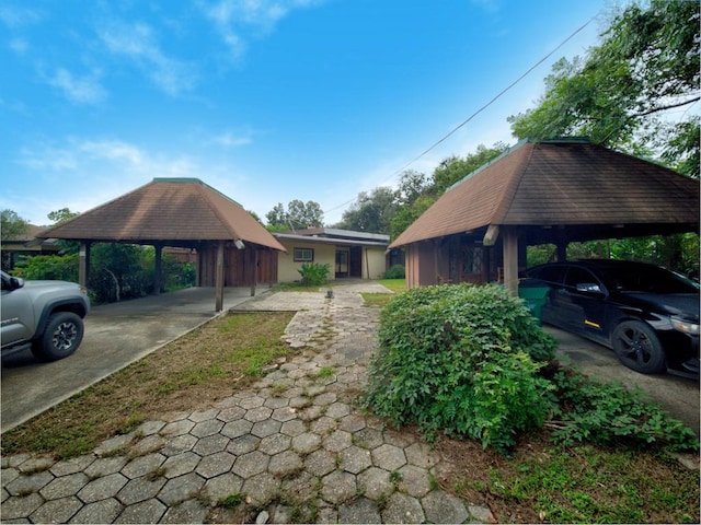 exterior space featuring a carport