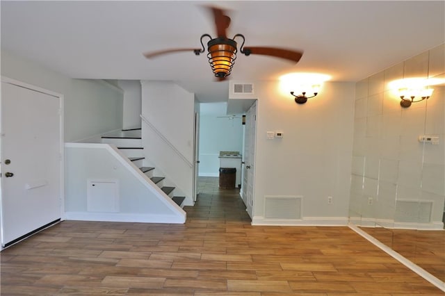 interior space featuring ceiling fan and hardwood / wood-style flooring