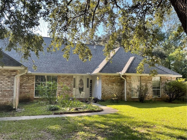 view of front of house with a front lawn