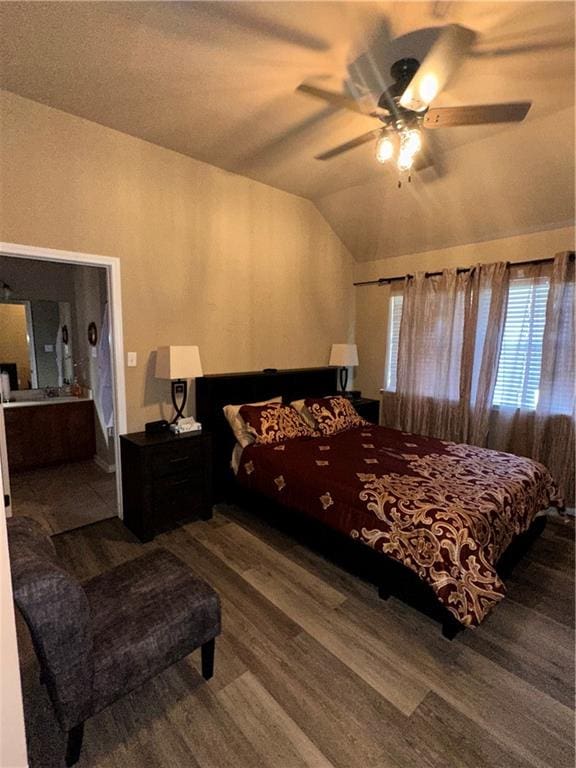 bedroom with wood-type flooring, vaulted ceiling, and ceiling fan