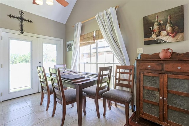 dining room with french doors, light tile patterned flooring, a wealth of natural light, and ceiling fan