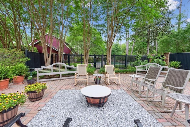 view of patio featuring a fire pit