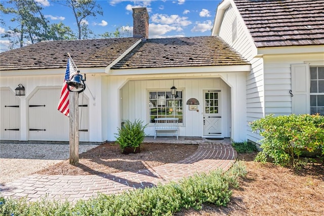 doorway to property featuring covered porch