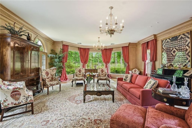 living room with a notable chandelier and ornamental molding