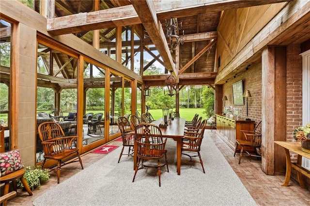 sunroom / solarium with beamed ceiling