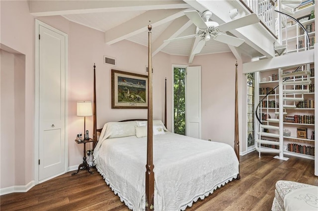 bedroom featuring vaulted ceiling with beams, ceiling fan, and dark wood-type flooring