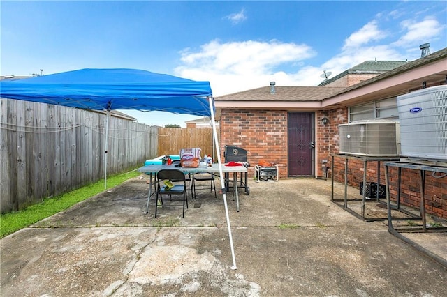 724042 Boston Dr, New Orleans, LA 70127 - view of patio / terrace with a fenced backyard and outdoor dining space